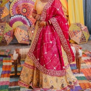 Elegant pink and Gold heavily Embroidered Lehenga